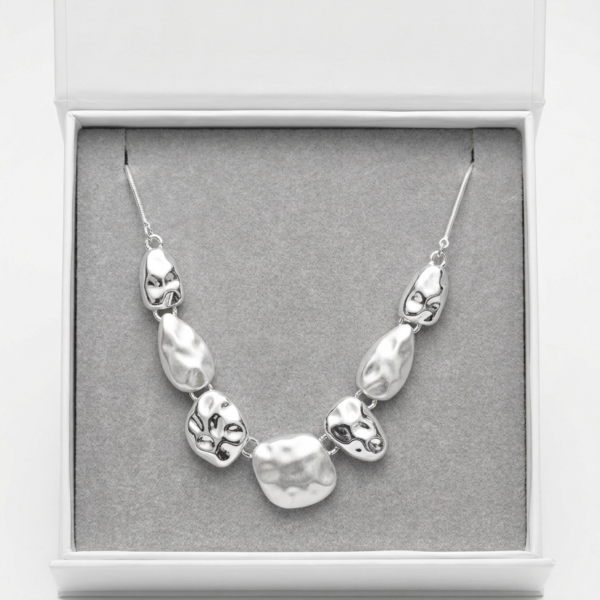 Collana Alex Arte Collezione Scintille – Design Organico a Elementi Mobili Argentati